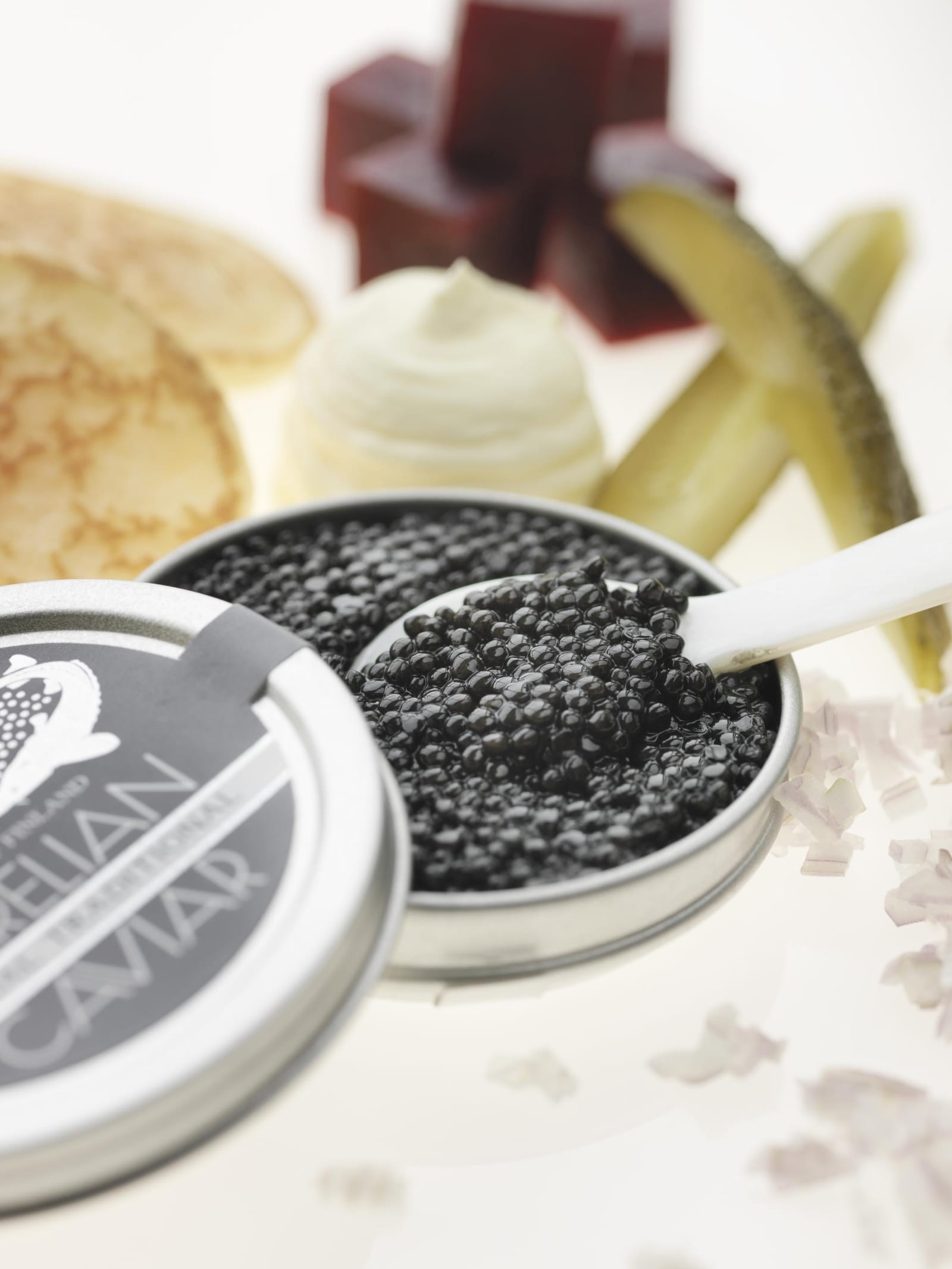 CARELIAN CAVIAR & BLINIS WITH PICKLED ONIONS & SOUR CREAM