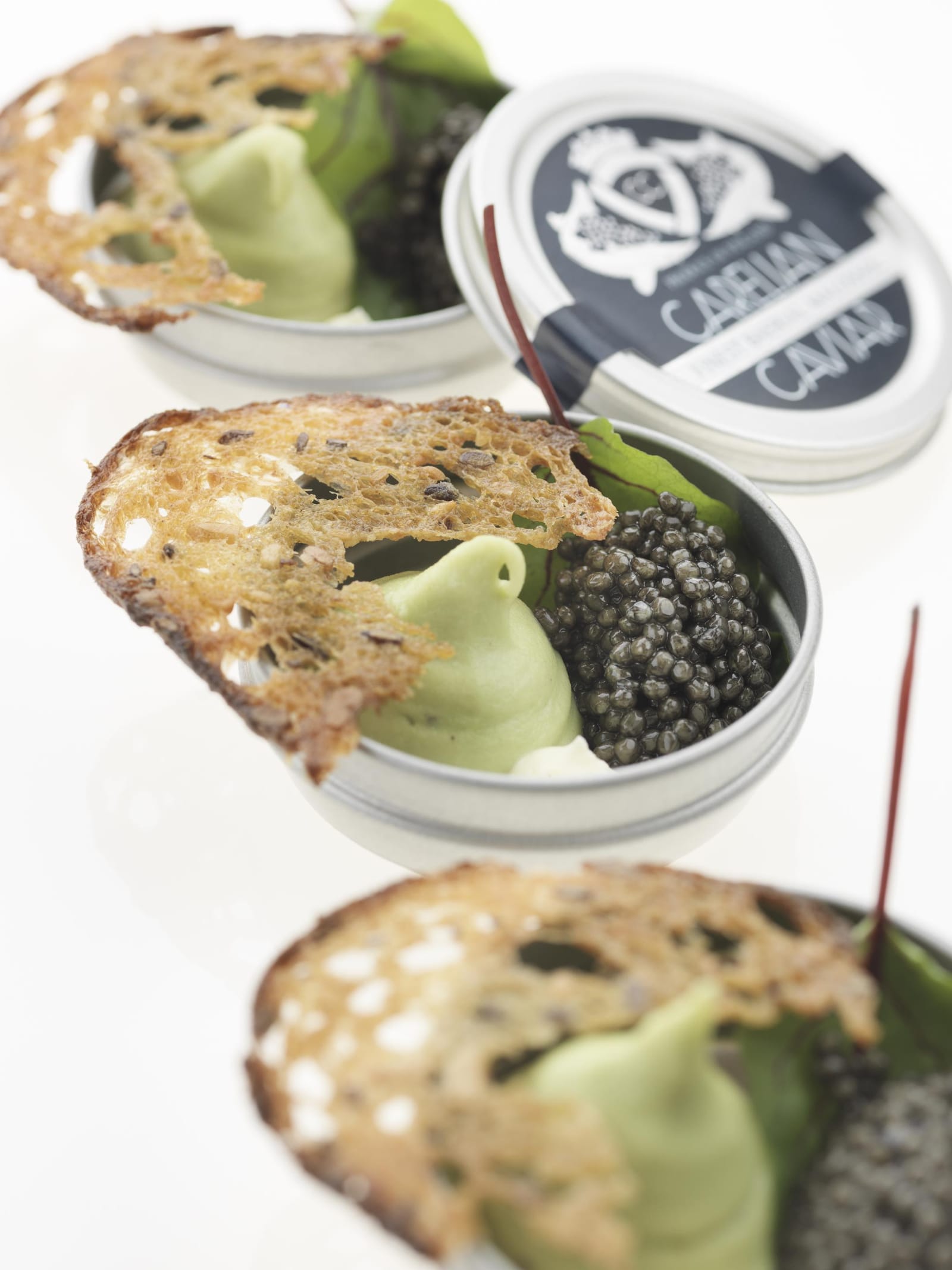 CARELIAN CAVIAR WITH CREAM ON ALMOND POTATOES AND SORREL